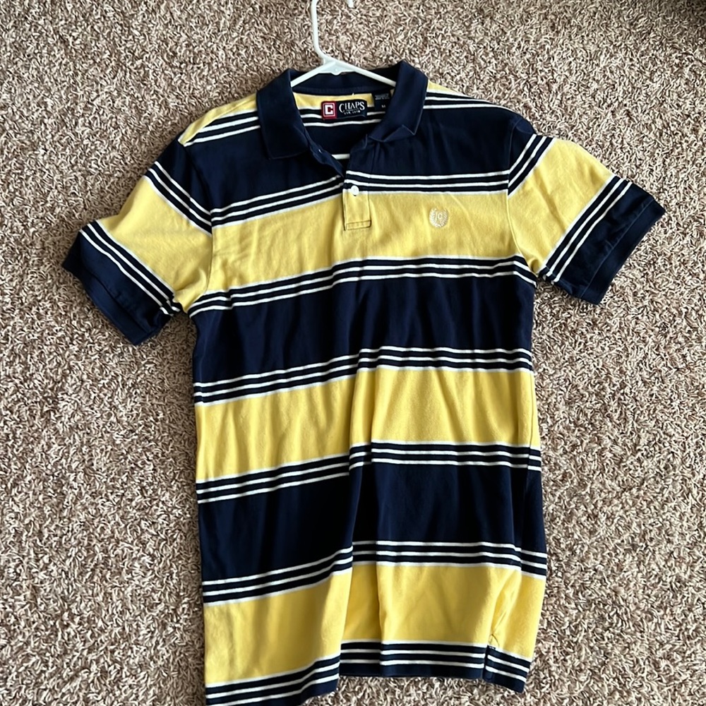 Used champs polo short sleeve shirt. Size medium.